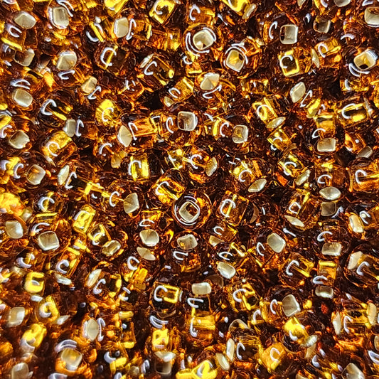 Preciosa Seed Beads - 8/0 Dark Topaz s/l